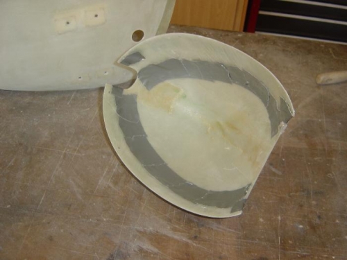 Saran Wrap release agent taped to nose halve