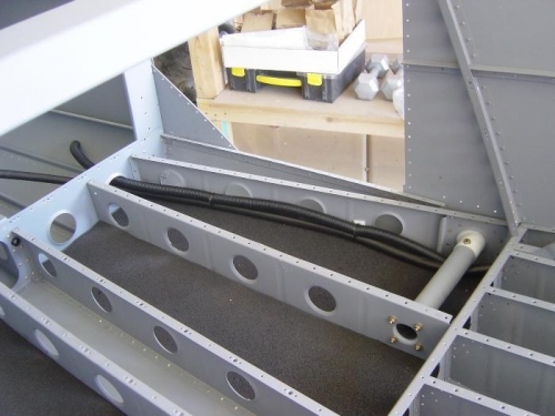 Dual electrical conduits in place and tied down