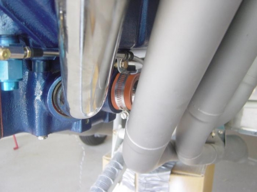 Throttle cable, clamped to induction tube