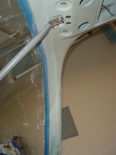 Sanding/cleaning up the cabin cover prior to paint.