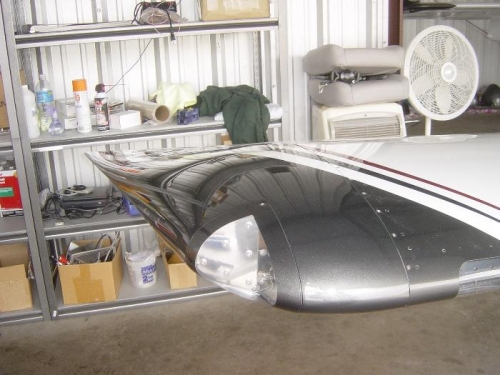 Right wing tip and landing light installed