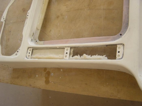 Minor repair work on fiberglass panel overlay