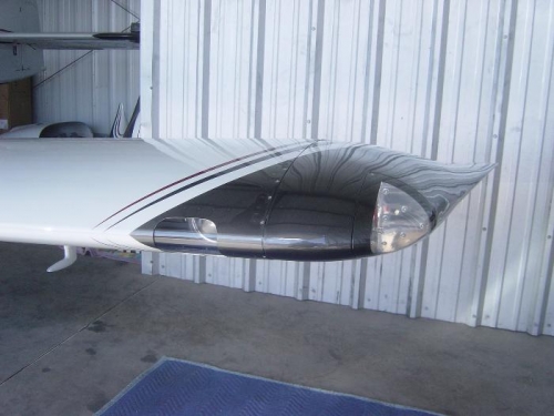 Left landing light and wing tip lens installed