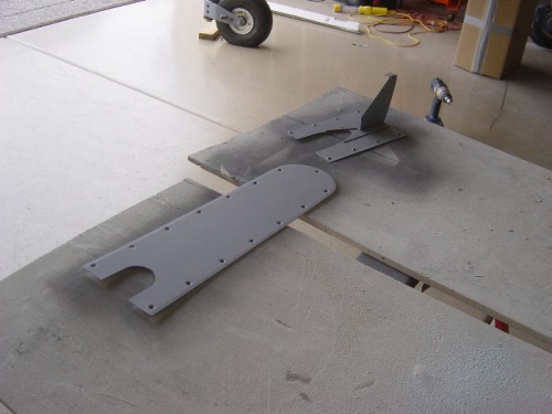 Nose gear leg slot covers primed