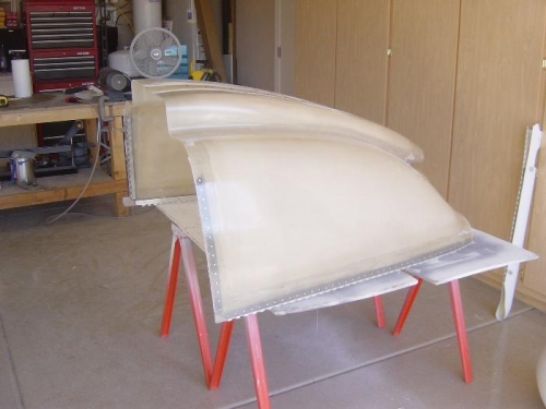 Glassed rivet lines on lower cowl