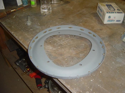 Carbon fiber backing/mounting plate primed and #10 nutpaltes installed