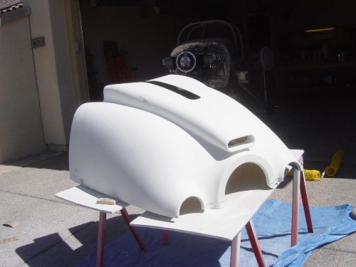 Two haevy coats ofr primere applied after initial pinoles filled