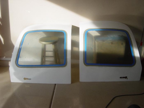 Both door windows floxed in place