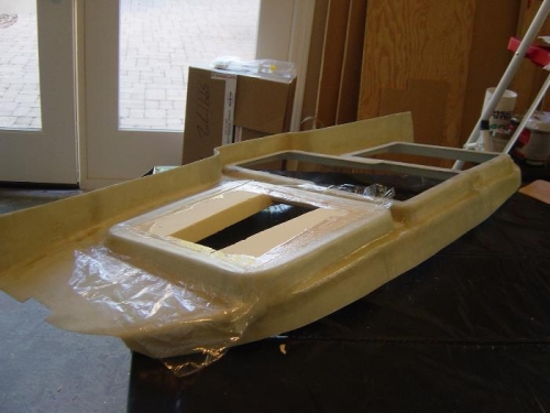 Glassed on some new flanges to the pilot panel that were cut off