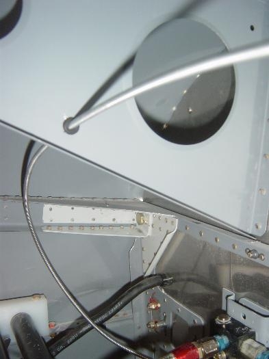 Cable routed through upper fwd fuse ribs