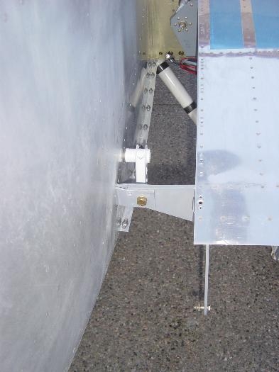 Right wing rear spar attach bolt drilled and fitted