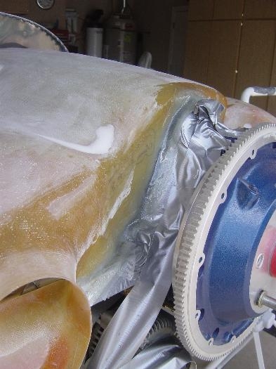 Lay up 4-6 plys around engine case