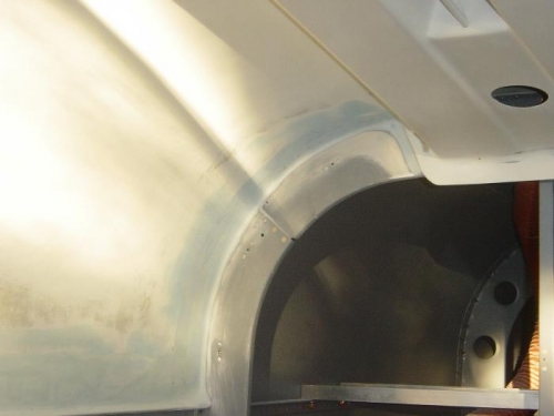 Overhead plenum belended into bulkhead