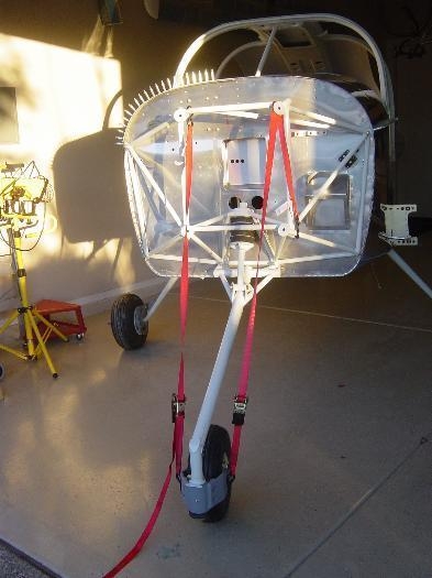 Elastomer Donuts compressed to install collar Assembly and bolt