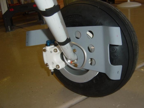 Attach bracket marked for nutplates