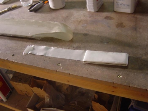 Extremely thin fiberglass tape.