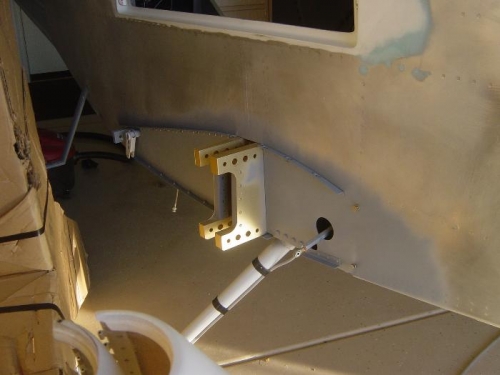 Fairing support brackets riveted to fuse