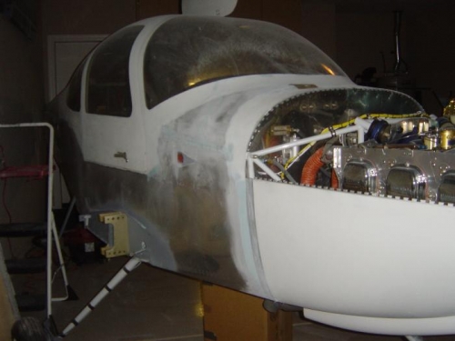 Right firewall/fuse skin sanded flush w/ cowl