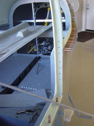 Pilot rear door post drilled to fuse uprights