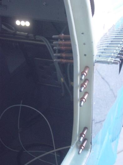 Co-pilot fron door post drilled to upright