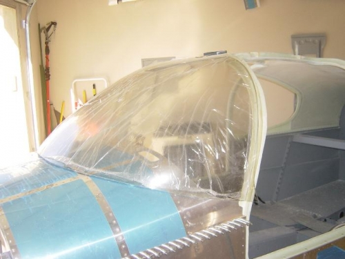 Fit and trimmed tha windscreen.