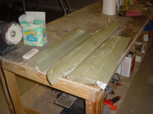 .003 glass tape layup to other side of gear leg hinges