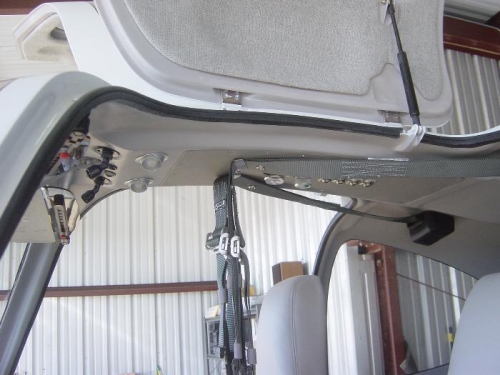 Seat belt capture bracket installed