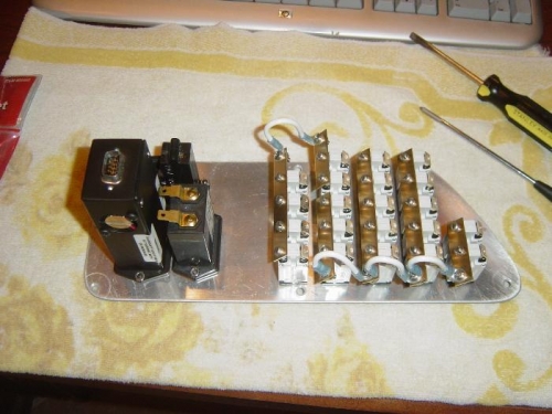 Power buss bars attached to breakers (Main & Aux)