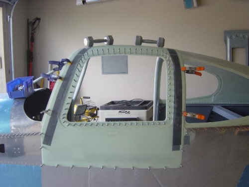 Pilot (L) door drilled and clecoed to fuse