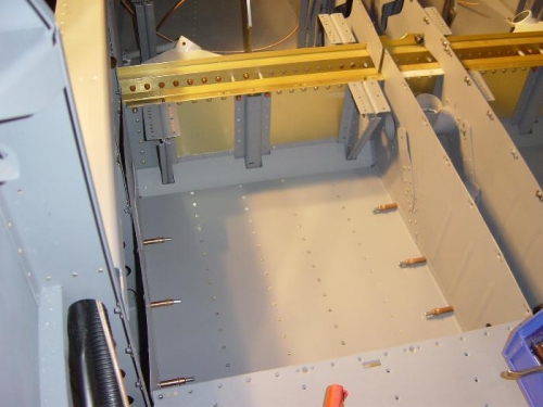Riveting the Left Seat floor pan