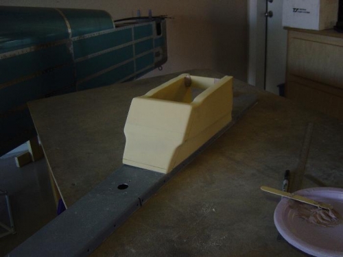 temporarilly bondo'd to the rib cover while shaping