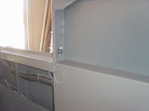 Door ajar reed switches positioned at each door pin receiver (4 in all)