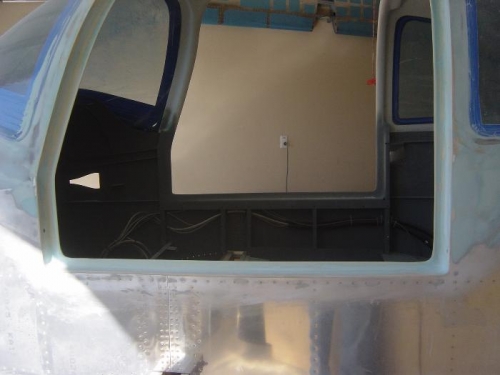 Lower portion of Left door jam filled and sanded.