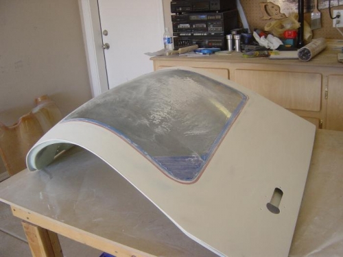 2 coats  of Primer reapplied to left door (and sanded