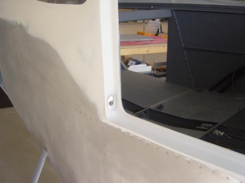 Aft door pin receiver trimmed and mounted