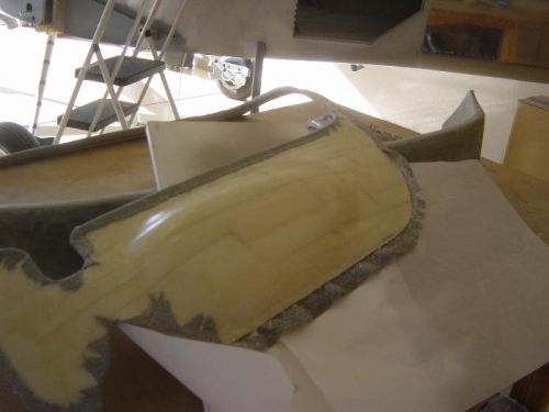 Finishing glueing last bit of fabric to interior door panel