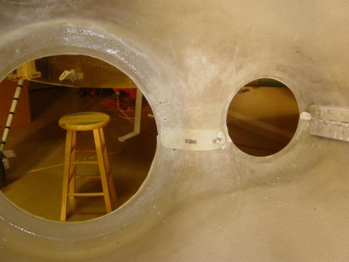 Forward flange lay-up sanded and nutplated attached