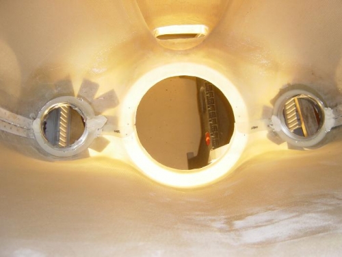 Epoxy/flox mixture injected and 'dams' built on each side of each ring for seperation