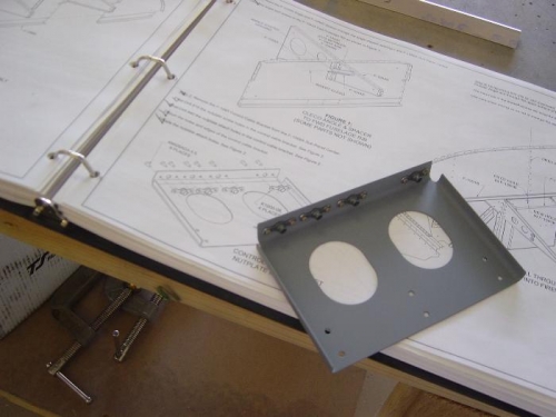 Nutplates installed on control cable bracket