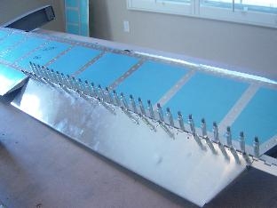 match dril hinge to elevator and to trim tab