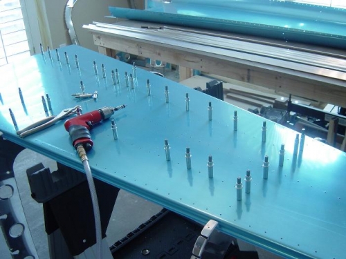 Cleco bottom skin to stiffeners and match drill