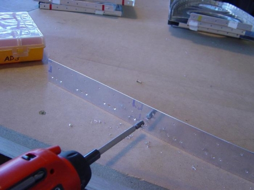 Countersink the splice strip nutplate rivet holes