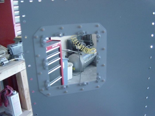 doubler riveted to left leading edge skin