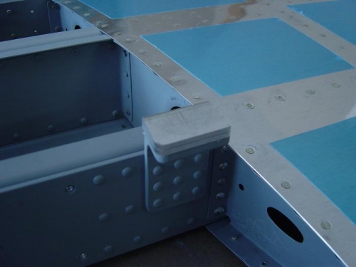 Close up of shims fab'd from alum. angle