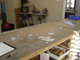 Left Flap parts deburred, dimpled, and scotchbrited