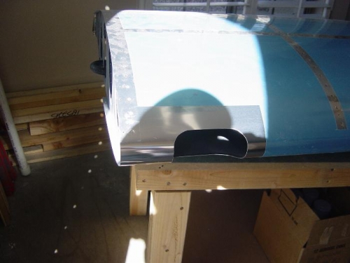 Lens hole cut into leading edge of Right wing