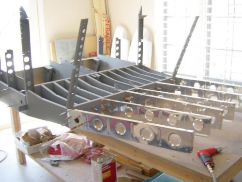 Debur then Cleco the baggage ribs and match drill