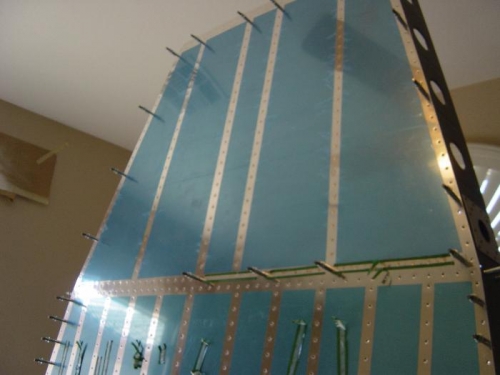 Baggage section riveted