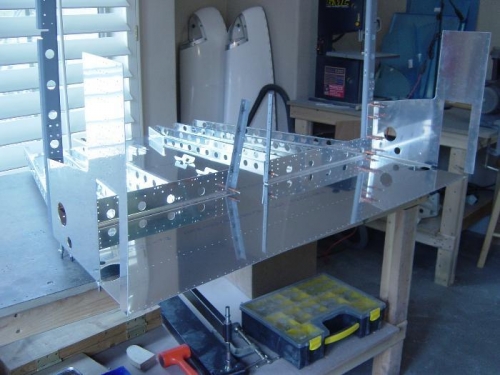 Add the F1004 assemblies to the fwd skin section