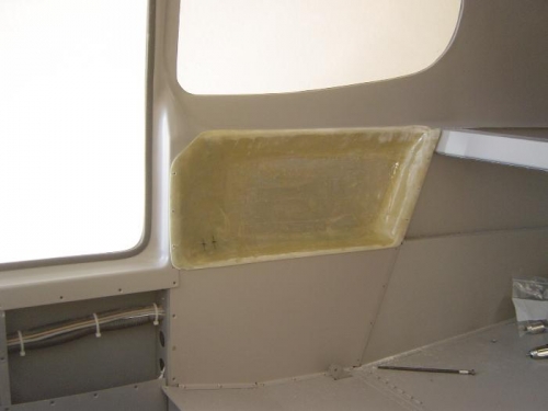 Fiberglass panel trimmed to final fit
